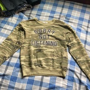 Green camo sweatshirt (Sorry not listening)